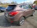 Kona Bronze - Tucson SE AWD Photo No. 7