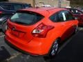 2014 Race Red Ford Focus SE Hatchback  photo #2