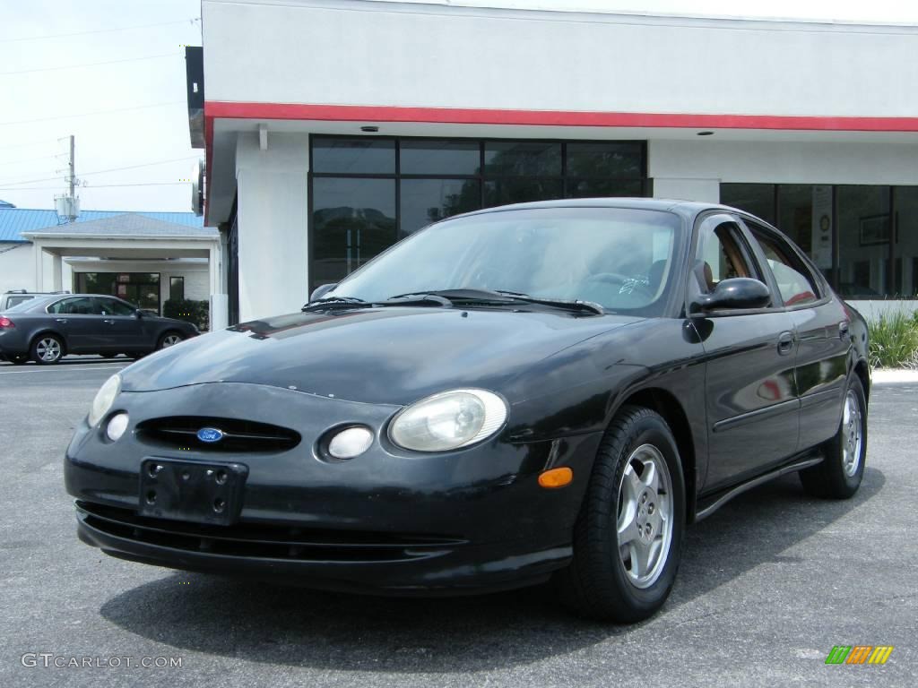 1997 Taurus SHO - Ebony Black Satin Metallic / Saddle photo #1