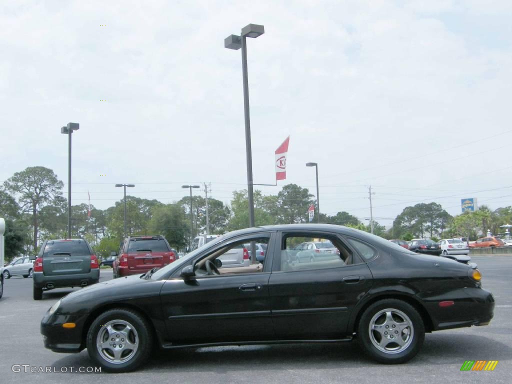 1997 Taurus SHO - Ebony Black Satin Metallic / Saddle photo #2