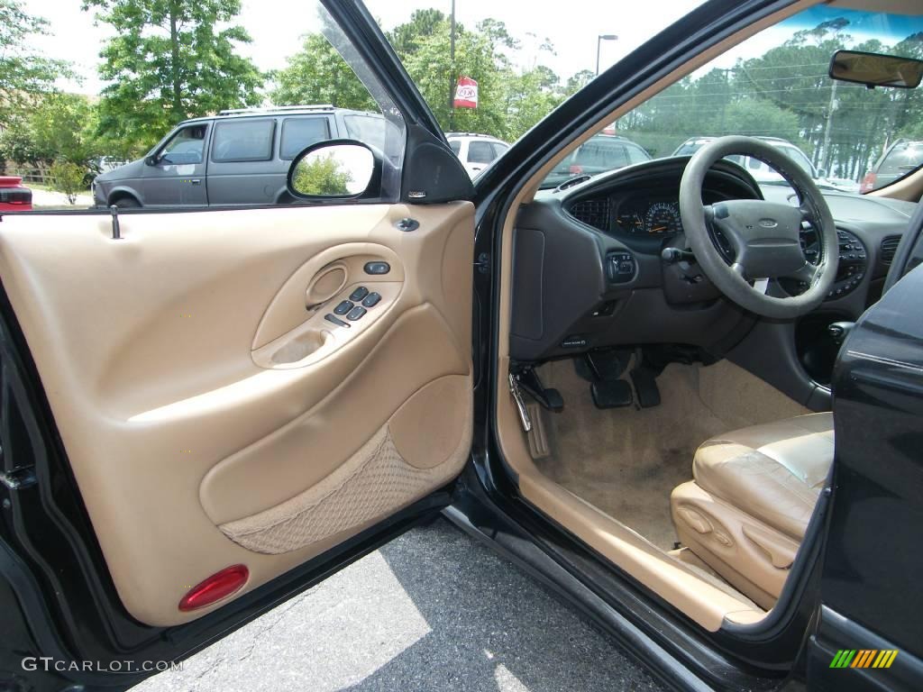1997 Taurus SHO - Ebony Black Satin Metallic / Saddle photo #12