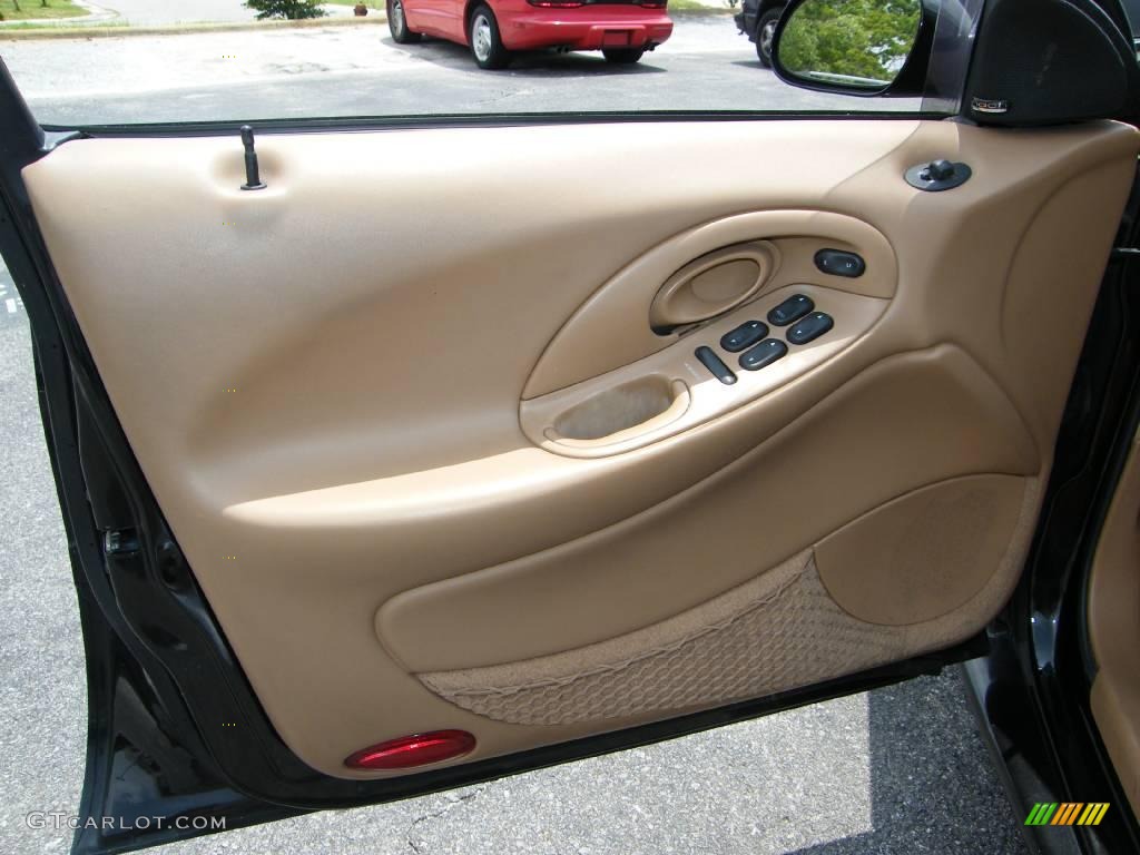 1997 Taurus SHO - Ebony Black Satin Metallic / Saddle photo #15