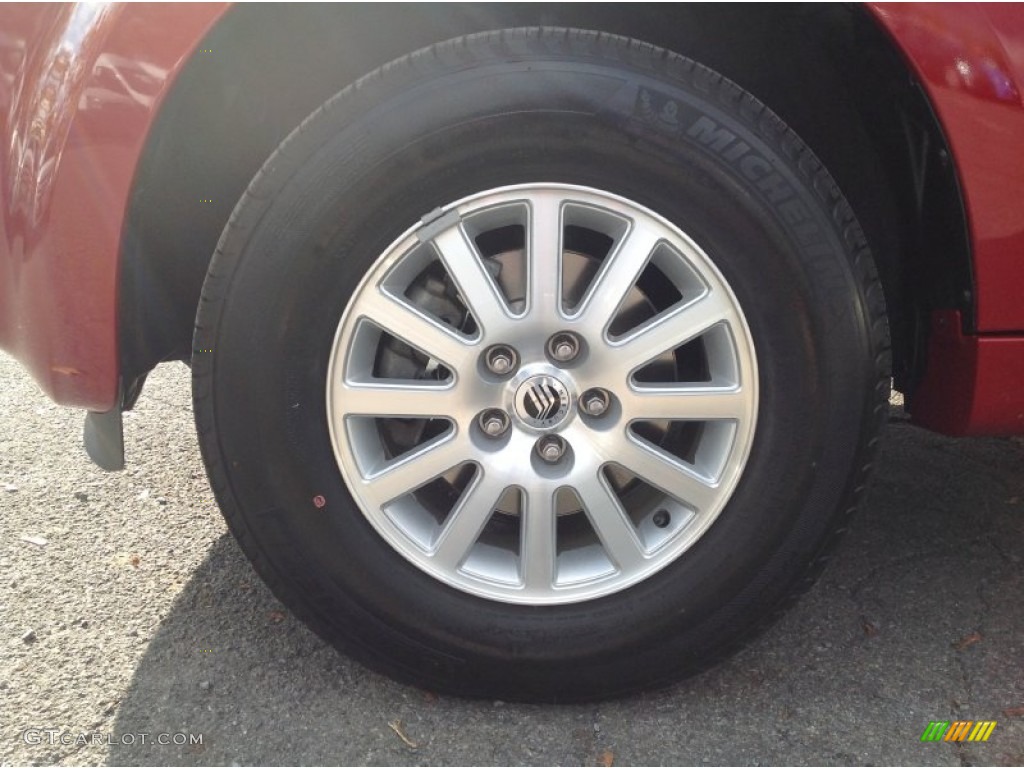 2010 Mariner V6 Premier 4WD - Sangria Red Metallic / Black photo #9