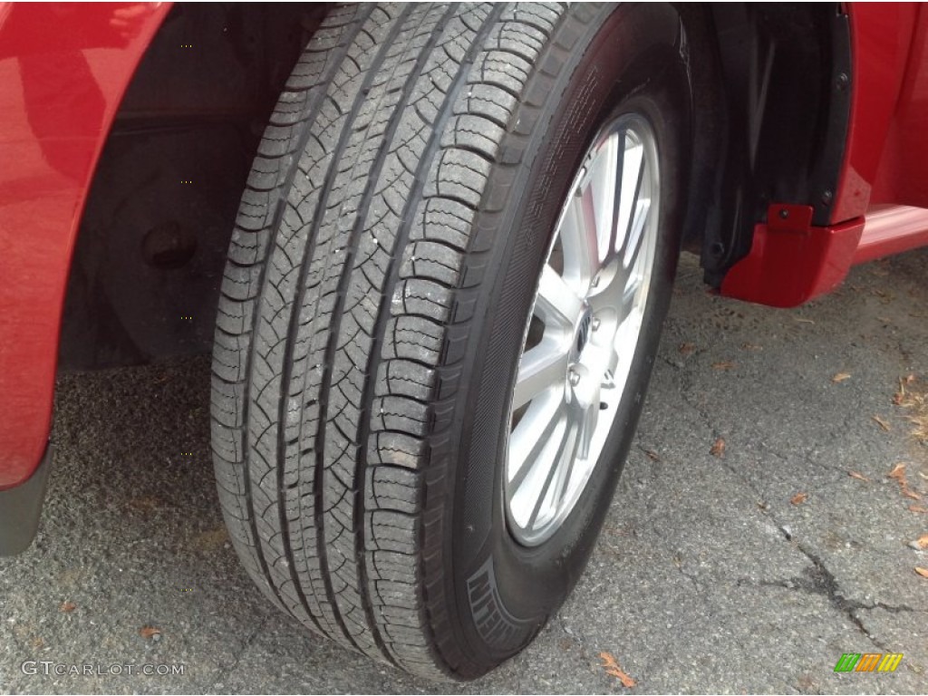 2010 Mariner V6 Premier 4WD - Sangria Red Metallic / Black photo #10