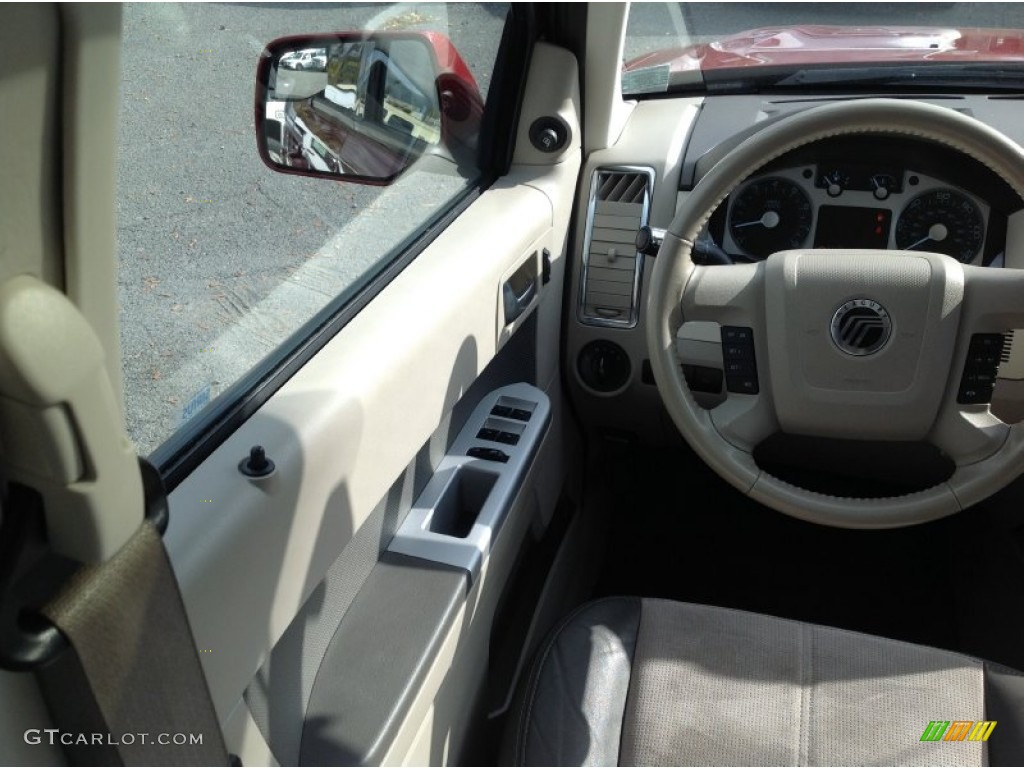 2010 Mariner V6 Premier 4WD - Sangria Red Metallic / Black photo #13