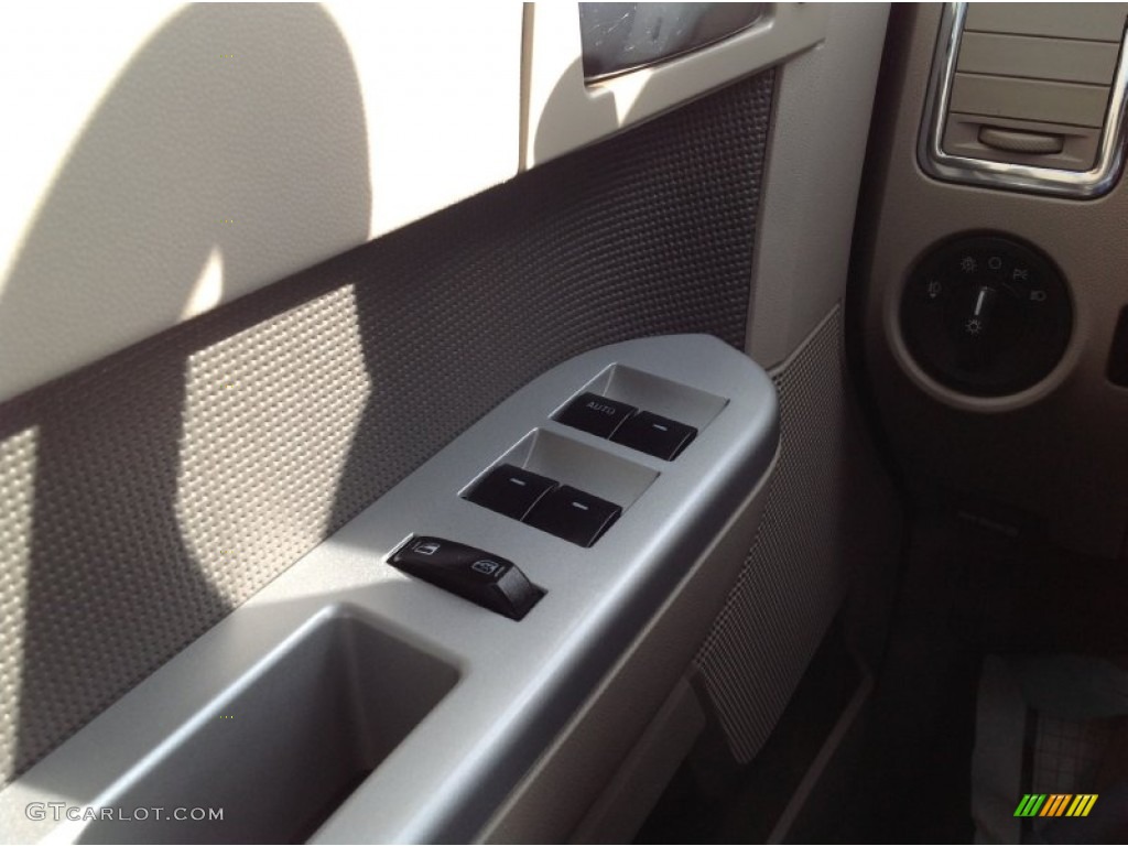 2010 Mariner V6 Premier 4WD - Sangria Red Metallic / Black photo #17