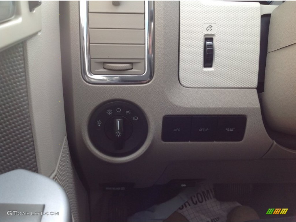 2010 Mariner V6 Premier 4WD - Sangria Red Metallic / Black photo #18