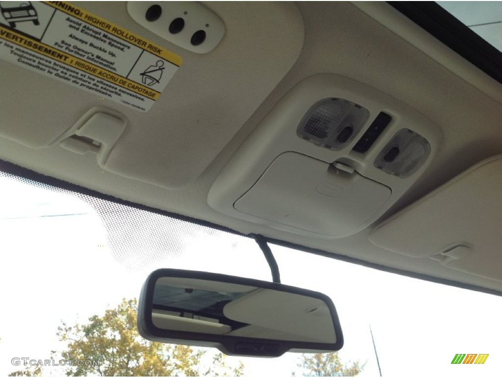 2010 Mariner V6 Premier 4WD - Sangria Red Metallic / Black photo #19