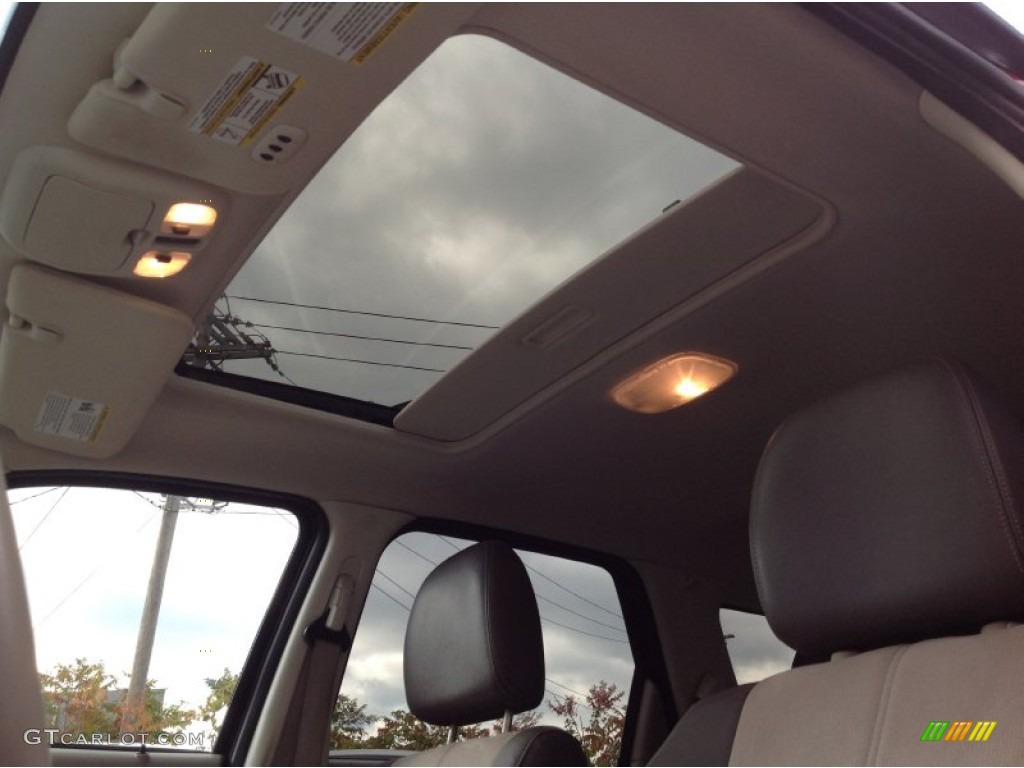 2010 Mariner V6 Premier 4WD - Sangria Red Metallic / Black photo #21