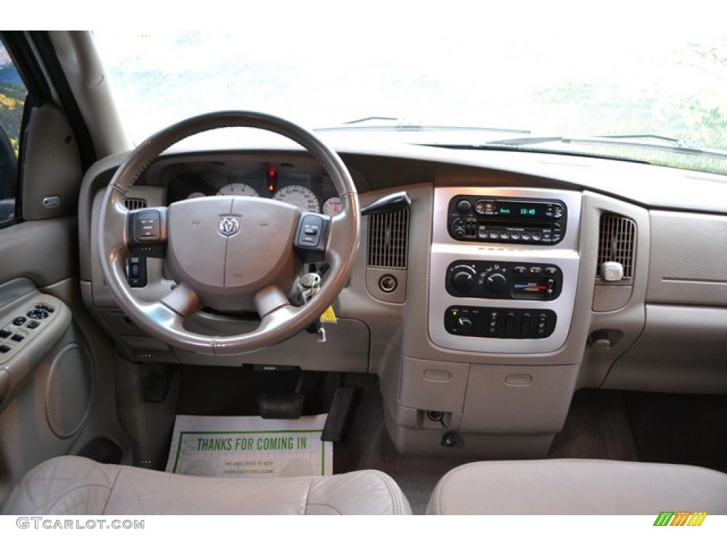 2004 Ram 1500 Laramie Quad Cab 4x4 - Bright White / Taupe photo #12