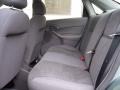 2004 Light Tundra Metallic Ford Focus SE Sedan  photo #10