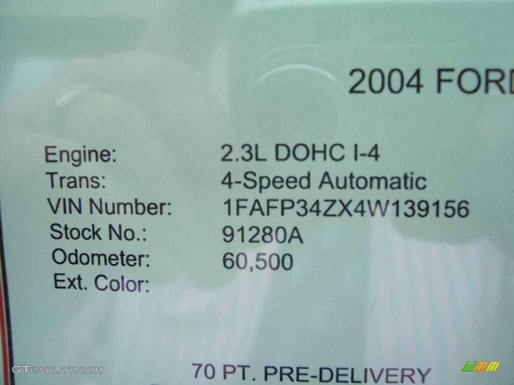 2004 Focus SE Sedan - Light Tundra Metallic / Medium Graphite photo #22