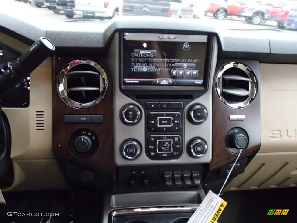 2014 F350 Super Duty Lariat Crew Cab 4x4 Dually - Ruby Red Metallic / Adobe photo #16