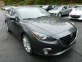 Front 3/4 View of 2014 MAZDA3 s Grand Touring 4 Door