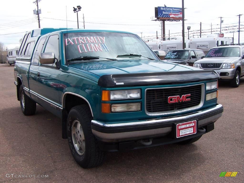 1994 Sierra 1500 SLE Extended Cab 4x4 - Bright Teal Metallic / Gray photo #21