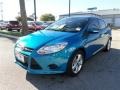 2014 Blue Candy Ford Focus SE Hatchback  photo #1