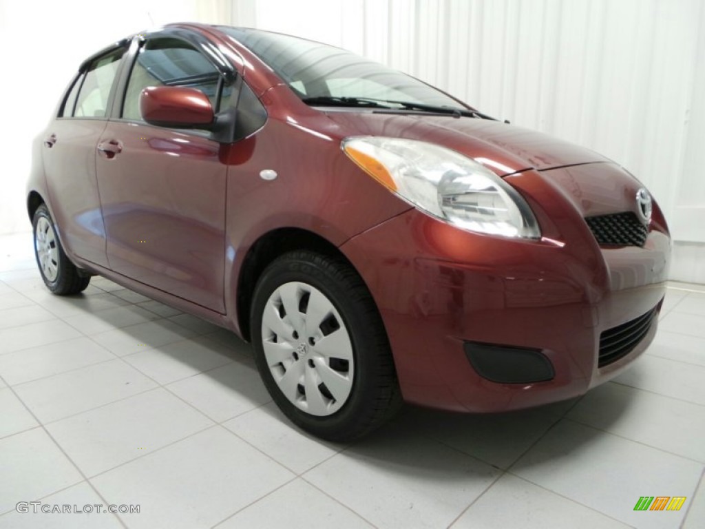 2009 Yaris 5 Door Liftback - Carmine Red Metallic / Dark Charcoal photo #1