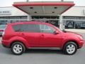 2010 Rally Red Metallic Mitsubishi Outlander ES 4WD  photo #4