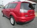 2010 Rally Red Metallic Mitsubishi Outlander ES 4WD  photo #7