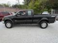 1997 Black Ford F150 XLT Extended Cab 4x4  photo #11