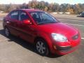 Tropical Red 2009 Kia Rio LX Sedan