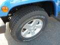 2014 Jeep Wrangler Freedom Edition 4x4 Wheel and Tire Photo