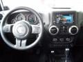 Black 2014 Jeep Wrangler Unlimited Sahara 4x4 Dashboard