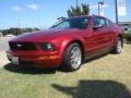 2005 Redfire Metallic Ford Mustang V6 Deluxe Coupe  photo #1