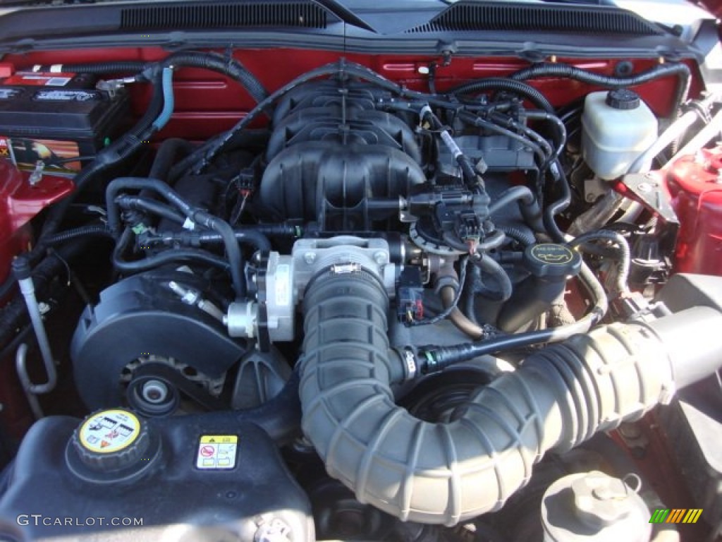 2005 Mustang V6 Deluxe Coupe - Redfire Metallic / Dark Charcoal photo #26