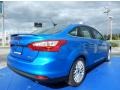 2014 Blue Candy Ford Focus Titanium Sedan  photo #3