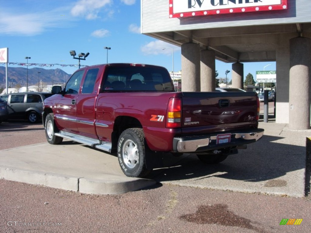 1999 Sierra 1500 SLE Extended Cab 4x4 - Dark Toreador Red Metallic / Graphite photo #9