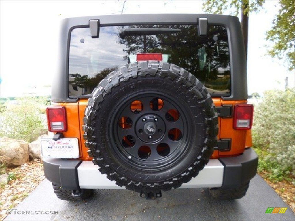 2011 Wrangler Unlimited Sahara 4x4 - Mango Tango Pearl / Black photo #10