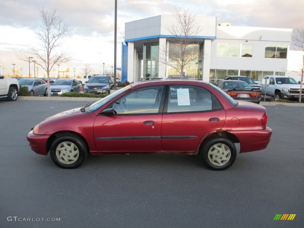 Sunset Red Metallic 2001 Chevrolet Metro LSi Exterior Photo #87731256