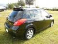 2009 Super Black Nissan Versa 1.8 SL Hatchback  photo #9