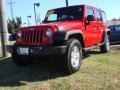 Flame Red 2009 Jeep Wrangler Unlimited X 4x4