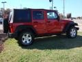 2009 Flame Red Jeep Wrangler Unlimited X 4x4  photo #6