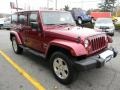 2011 Deep Cherry Red Jeep Wrangler Unlimited Sahara 4x4  photo #4