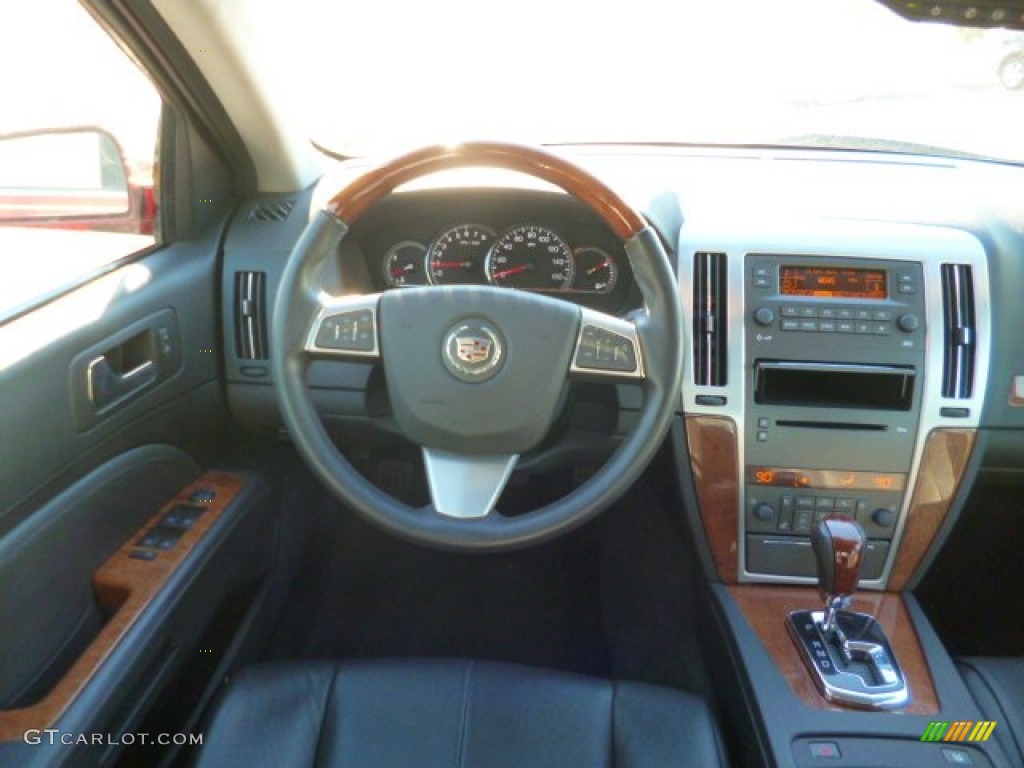 2010 STS 4 V6 AWD - Crystal Red Tintcoat / Ebony photo #13