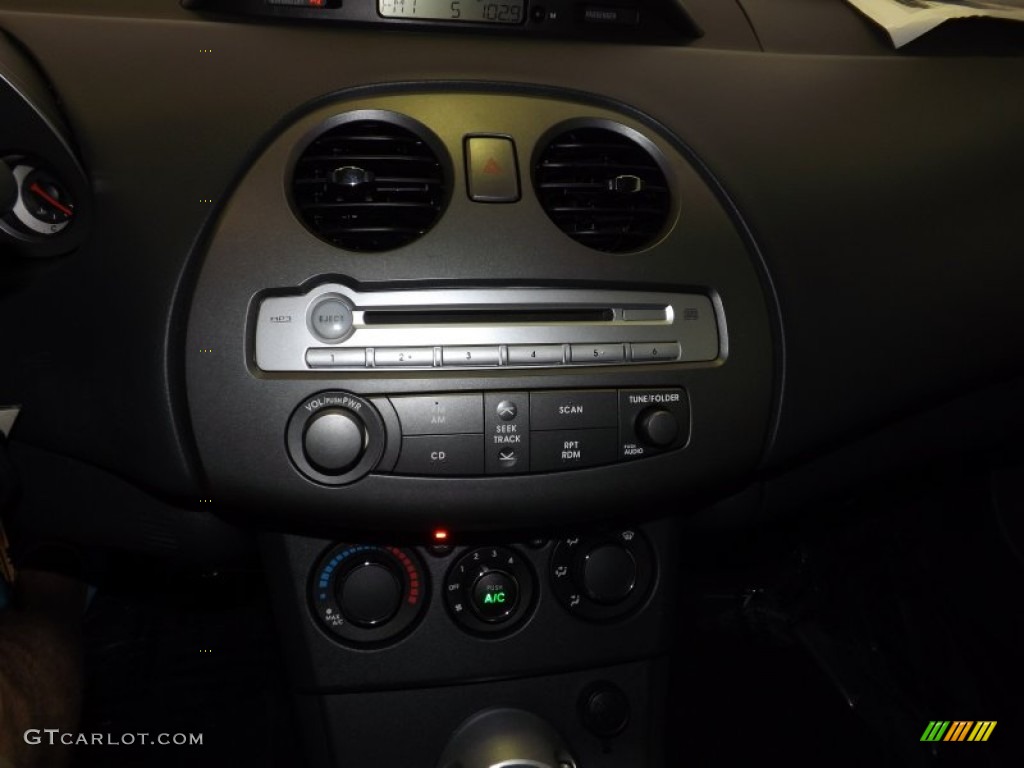 2009 Eclipse GS Coupe - Sunset Pearlescent Pearl / Dark Charcoal photo #16