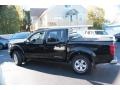 2009 Super Black Nissan Frontier SE Crew Cab 4x4  photo #11