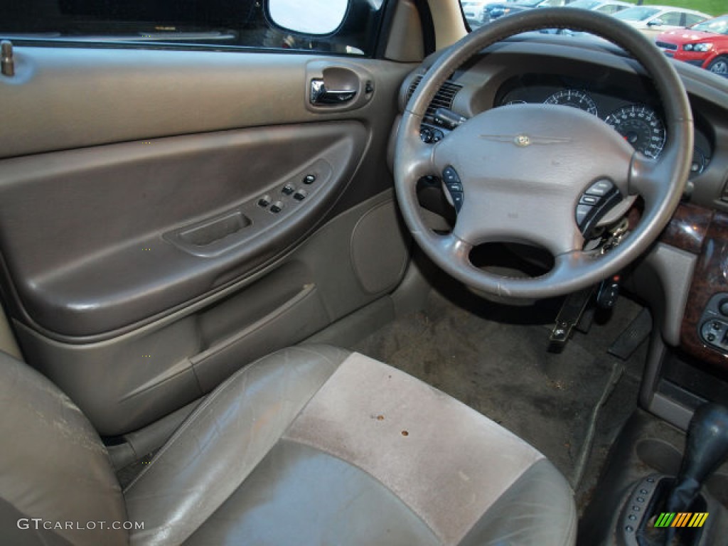 2004 Sebring LXi Sedan - Light Almond Pearl Metallic / Taupe photo #11