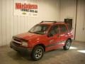 Wildfire Red 2000 Chevrolet Tracker 4WD Hard Top