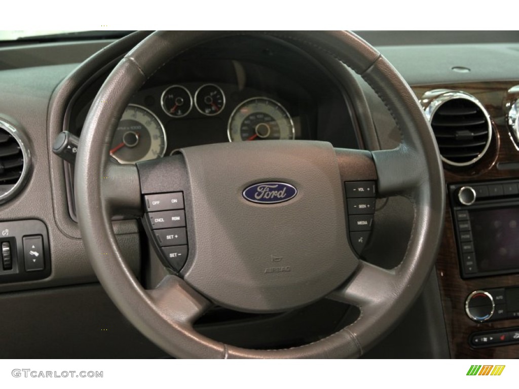 2009 Ford Taurus X Eddie Bauer Camel Steering Wheel Photo #88076751