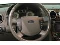 2009 Ford Taurus X Camel Interior Steering Wheel Photo