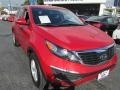 2011 Signal Red Kia Sportage LX  photo #1