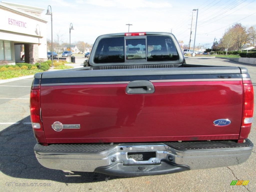 2003 F150 Heritage Edition Supercab - Toreador Red Metallic / Black/Red photo #6