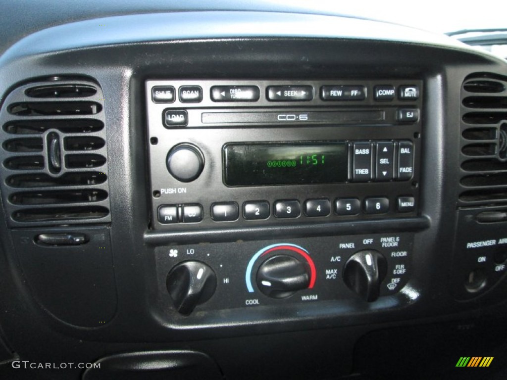 2003 F150 Heritage Edition Supercab - Toreador Red Metallic / Black/Red photo #22