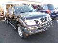 Super Black 2010 Nissan Frontier LE Crew Cab 4x4