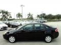 2011 Ebony Black Ford Focus S Sedan  photo #12