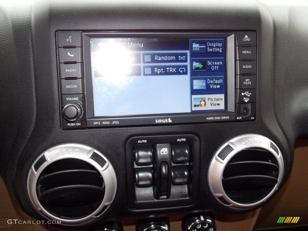 2011 Jeep Wrangler Unlimited Sahara 4x4 Controls Photo #88294346